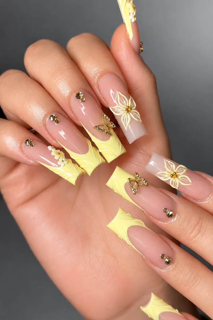 Yellow French tips with 3D flowers